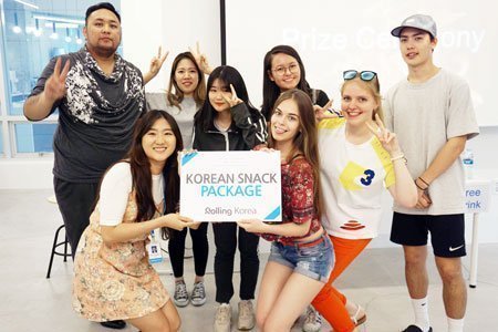 A group of students celebrating to win Korean quiz